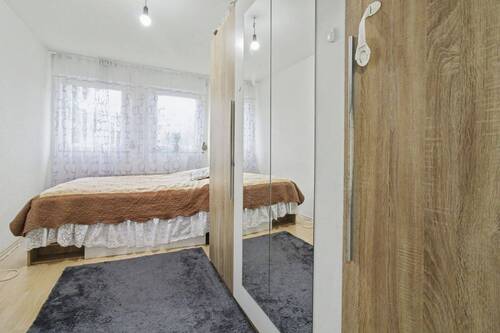 Schlafzimmer - Etagenwohnung mit 70,30 m&sup2; in Heusenstamm zum Kaufen