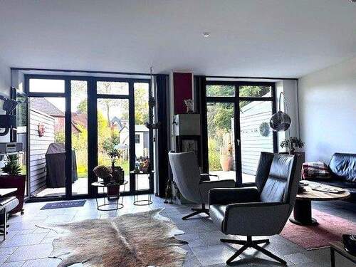 04-Wohnbereich mit Zugang zu Terrasse und Garten - Reihenmittelhaus mit 122,40 m² in Eutin zum Kaufen