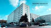 Gebäudeansicht - WEIGERT: Renovierungsbedürftige 3-Zimmer-Wohnung mit großer Loggia und TG-Stellplatz in Ingolstadt