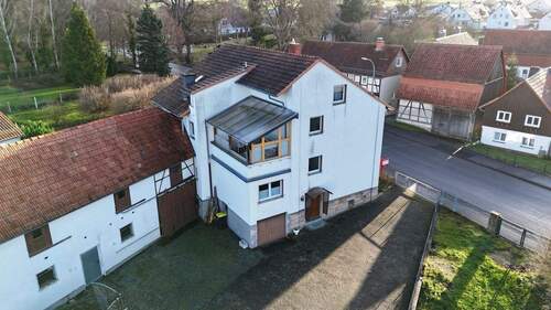 Außenansicht - Mehrfamilienhaus, Wohnhaus mit 250,00 m&sup2; in Meißner zum Kaufen