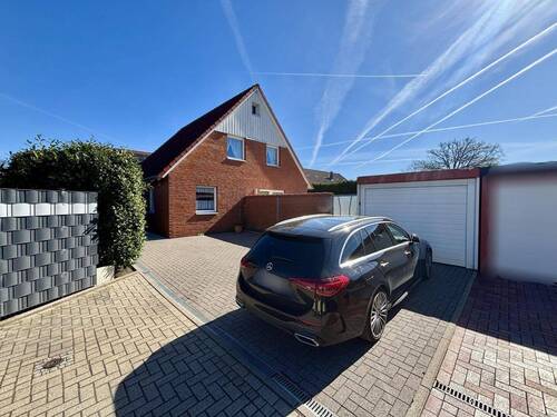 Vor dem Haus - Einfamilienhaus mit 149,10 m&sup2; in Wedemark zum Kaufen