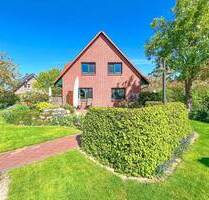 EINZIEHEN UND WOHLFÜHLEN: EINFAMILIENHAUS MIT MODERNER TECHNIK IN TOP-LAGE VON SITTENSEN