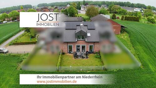 Rückseite Genhülsen - Hochwertiges Reihenmittelhaus in idyllischer Lage - energieeffizient & stilvoll