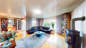 Wohnzimmer mit Ofen und Panorama - 4 Zimmer Mehrfamilienhaus, Wohnhaus in Ingolstadt