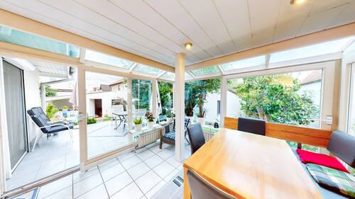 Wintergarten mit Zugang zur Terrasse - 