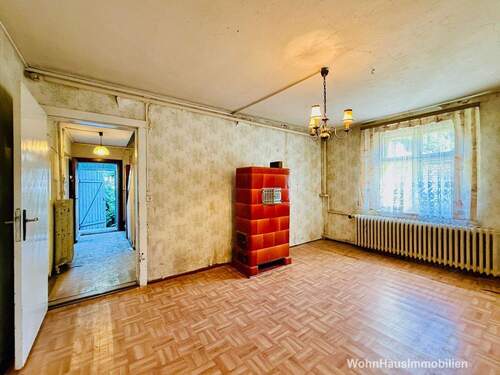 Wohnzimmer mit Ofen - Grundstück in Panketal zum Kaufen