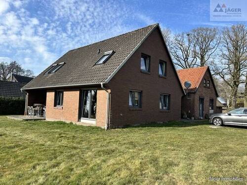 Gartenansicht - Mehrfamilienhaus, Wohnhaus mit 261,00 m² in Hude (Oldenburg) / Nordenholz zum Kaufen