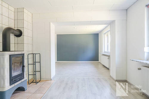 Wohn- Esszimmerbereich mit Kamin im EG - 