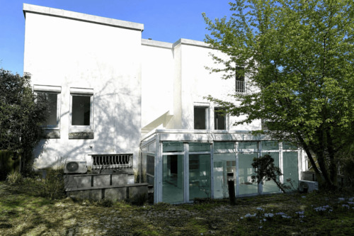 Rückansicht mit Wintergarten - 1 Zimmer Einfamilienhaus in Erkrath