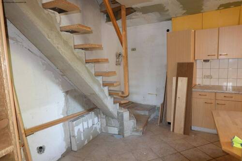 Wohnküche mit Treppe zum OG - 