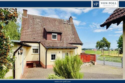 Titel - Beste Basis - charmantes Einfamilienhaus mit Nebengebäuden und Garage