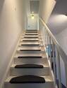 Treppe ins Obergeschoss - 