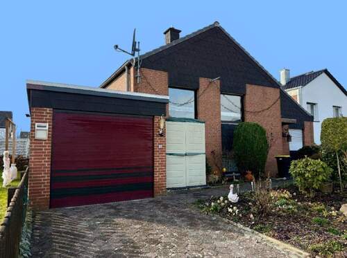 Haus kaufen Fröndenberg-Hohenheide - Fröndenberg-Hohenheide: Einseitig angebautes Einfamilienhaus mit Garage in beliebter Wohnlage!