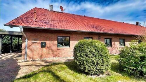 Gebäudeansicht 1 - 4 Zimmer Doppelhaushälfte zum Kaufen in Nossentiner Hütte