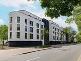 Ansicht Straße - Moderne 4-Zimmer-Wohnung im KfW40-QnG-Standard mit Loggia in Osnabrück-Eversburg