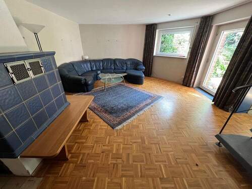 Wohnzimmer mit Kachelofen - 