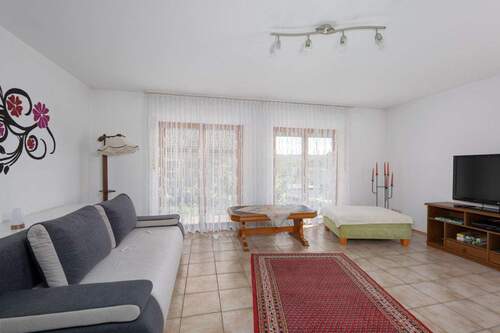 Wohnzimmer EG - 5 Zimmer Einfamilienhaus zum Kaufen in Kämpfelbach / Bilfingen