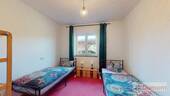 Schlafzimmer der 95 qm Einheit - 
