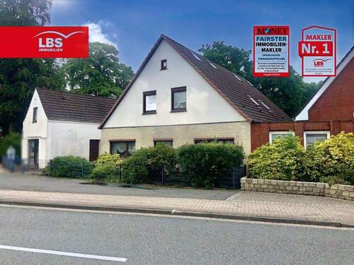 Bild 2 - 7 Zimmer Mehrfamilienhaus, Wohnhaus zum Kaufen in Schwanewede