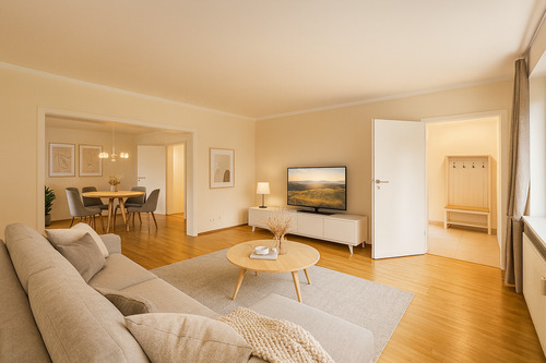 Visualisierung offener Wohn- und Essbereich im Erdgeschoss des Haupthauses - 5 Zimmer Einfamilienhaus in Bochum