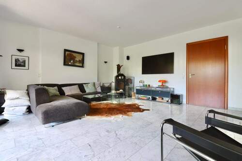 Wohnbereich mit Kaminofen - EG - 1 Zimmer Mehrfamilienhaus, Wohnhaus in Goslar