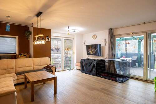 Wohnzimmer - Einfamilienhaus mit 130,00 m² in Lemwerder zum Kaufen