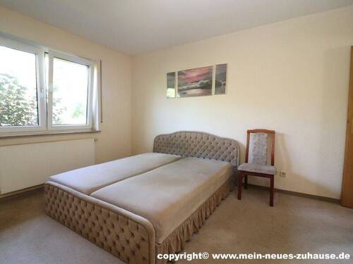 Bild 6 Schlafzimmer Erdgeschoss - 