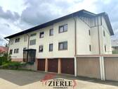 1_Außenansicht - Gemütliche 2,5-Zimmer-Erdgeschosswohnung mit einer Terrasse und Einzelgarage!
