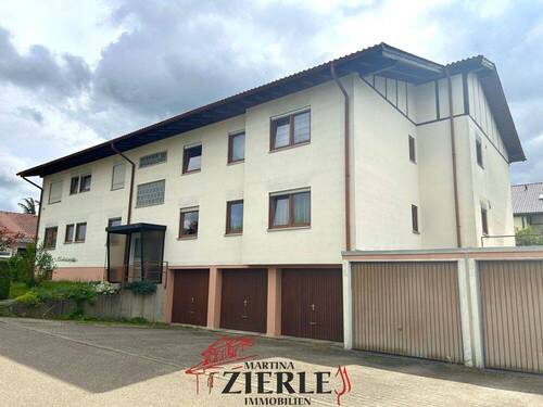 1_Außenansicht - Gemütliche 2,5-Zimmer-Erdgeschosswohnung mit einer Terrasse und Einzelgarage!