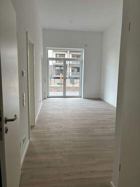 Wohnbereich - Attraktive 2-Zimmerwohnung mit Terrasse, Garten und Stellplatz
