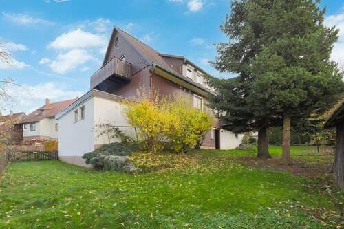 Rückansicht und Garten - 1 Zimmer Mehrfamilienhaus, Wohnhaus zum Kaufen in Oberreichenbach - Würzbach