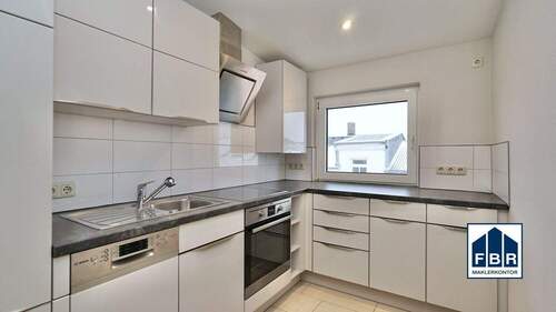 Küche mit Einbauküche - 