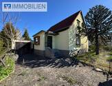 seitliche Hausansicht - Einfamilienhaus mit Garten, Garage, Pool in toller Wohnlage