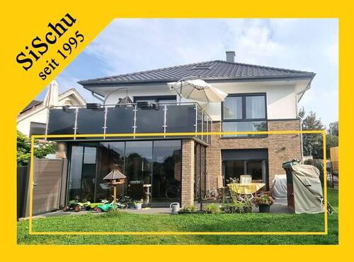 Hausansicht - Exklusives Wohneigentum im Erdgeschoss mit Garten!