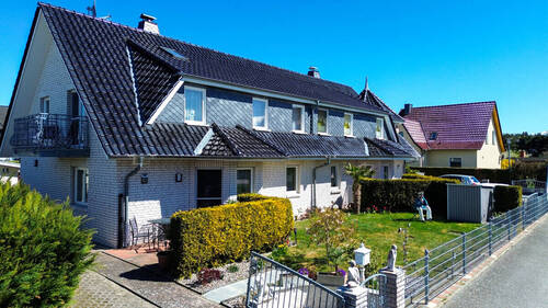 Vorgarten - Mehrfamilienhaus, Wohnhaus mit 350,00 m&sup2; in Ückeritz zum Kaufen