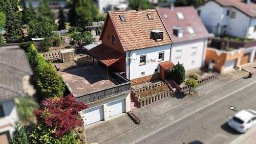 Bild 1 - +++Südausrichtung!!! Einfamilienhaus mit Südterrasse, Garten und Doppelgarage+++