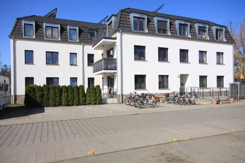 Hausansicht - Etagenwohnung mit 65,00 m² in Falkensee zum Kaufen