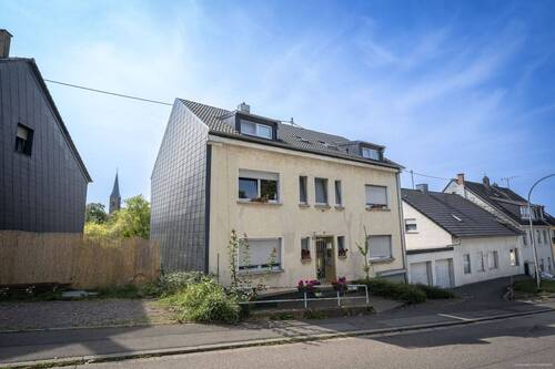 Front - Etagenwohnung zum Kaufen in Saarbrücken / Altenkessel