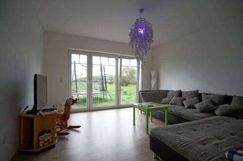 Wohnzimmer (WE links) - 6 Zimmer Einfamilienhaus zum Kaufen in Schiffdorf / Wehden