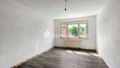 Wohnzimmer 1 - 3 Zimmer Etagenwohnung zum Kaufen in Rackwitz