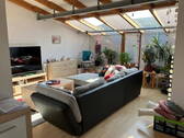 Wohnzimmer mit Loggia - Sonnige 2-Zimmer-ETW mit Loggia und Dachterrasse