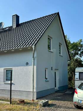 Haus_Isar_Ansicht1_mit Sonderausstattung.jpeg - 4 Zimmer Einfamilienhaus zum Kaufen in Taucha