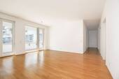 Wohnzimmer - AIGNER - Moderne 4-Zimmer Erdgeschosswohnung mit urbanem Flair in Toplage Haidhausen