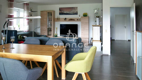 Wohnzimmer im Erdgeschoss mit Zugang zur Terrasse - Einfamilienhaus mit 203,00 m² in Parchim zum Kaufen