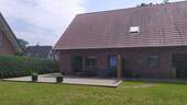 Außenansicht Rückseite mit Terrasse - 4 Zimmer Einfamilienhaus in Hagen im Bremischen / Driftsethe