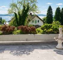 Lichtdurchflutete 3-Zimmer-Wohnung mit großer Dachterrasse und traumhaftem Seeblick in Tutzing