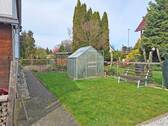 Garten seitlich - 4 Zimmer Einfamilienhaus in Brandis
