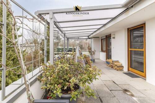 Dachterrasse mit Glaswand und Heat-Stop-Dach - 