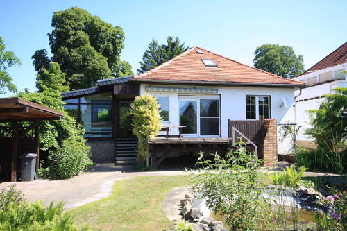 Hausansicht - Zur Sanierung: Charmantes Einfamilienhaus mit Wintergarten von 1928 auf sonnigem Südgrundstück
