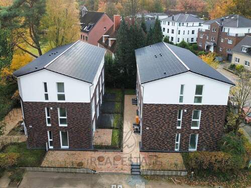 1.jpg - Erstbezug! Stilvolles Reihenhaus in begehrter Lage von Volksdorf